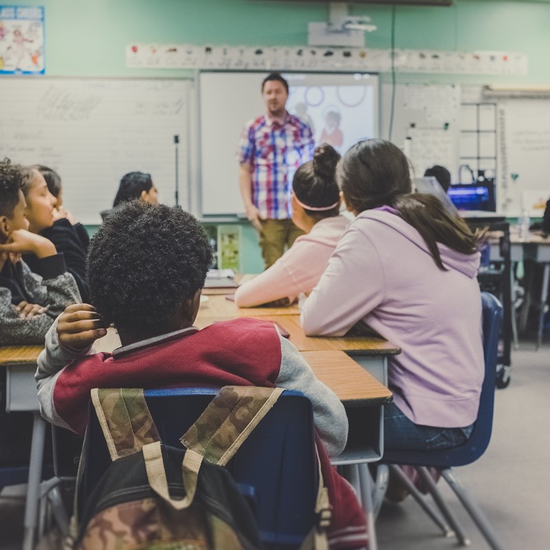 Stock photo of students in a classroom.
