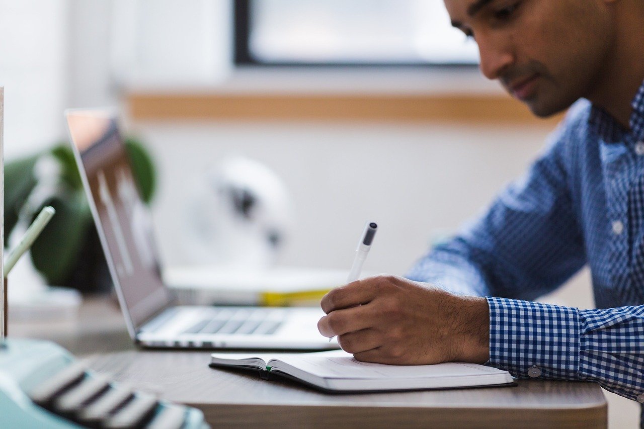 Picture of a man at a desk